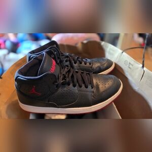 Jordan Black and Red Mid-Top Sneakers